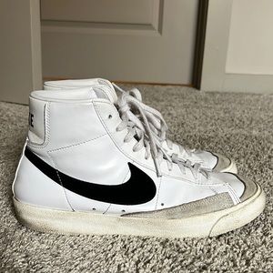 White and black Nike blazers